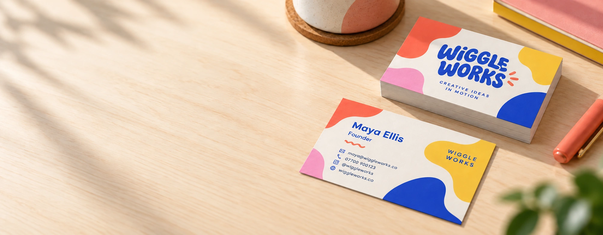 Wiggle Works branded 450gsm silk business cards, printed by instantprint